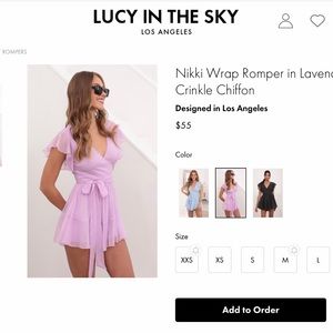 Lucy in the Sky lavender romper. M